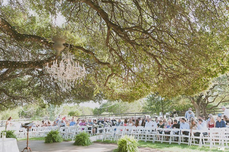 Ceremony under tree at Antebellum Oaks