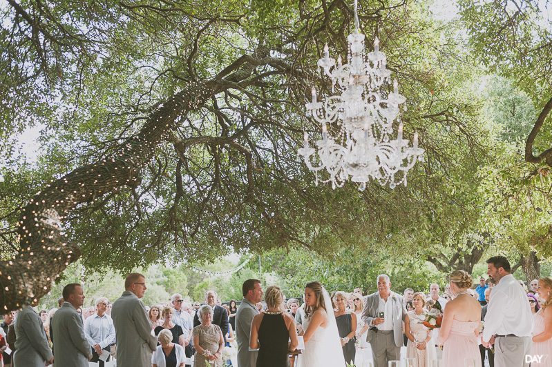 Ceremony under tree at Antebellum Oaks